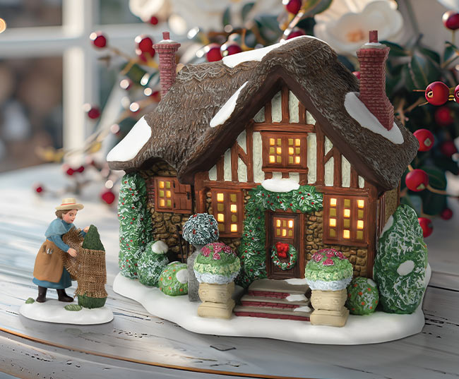 Lord Lilliput's Cottage lighted building and Preparing For The Frost figurine