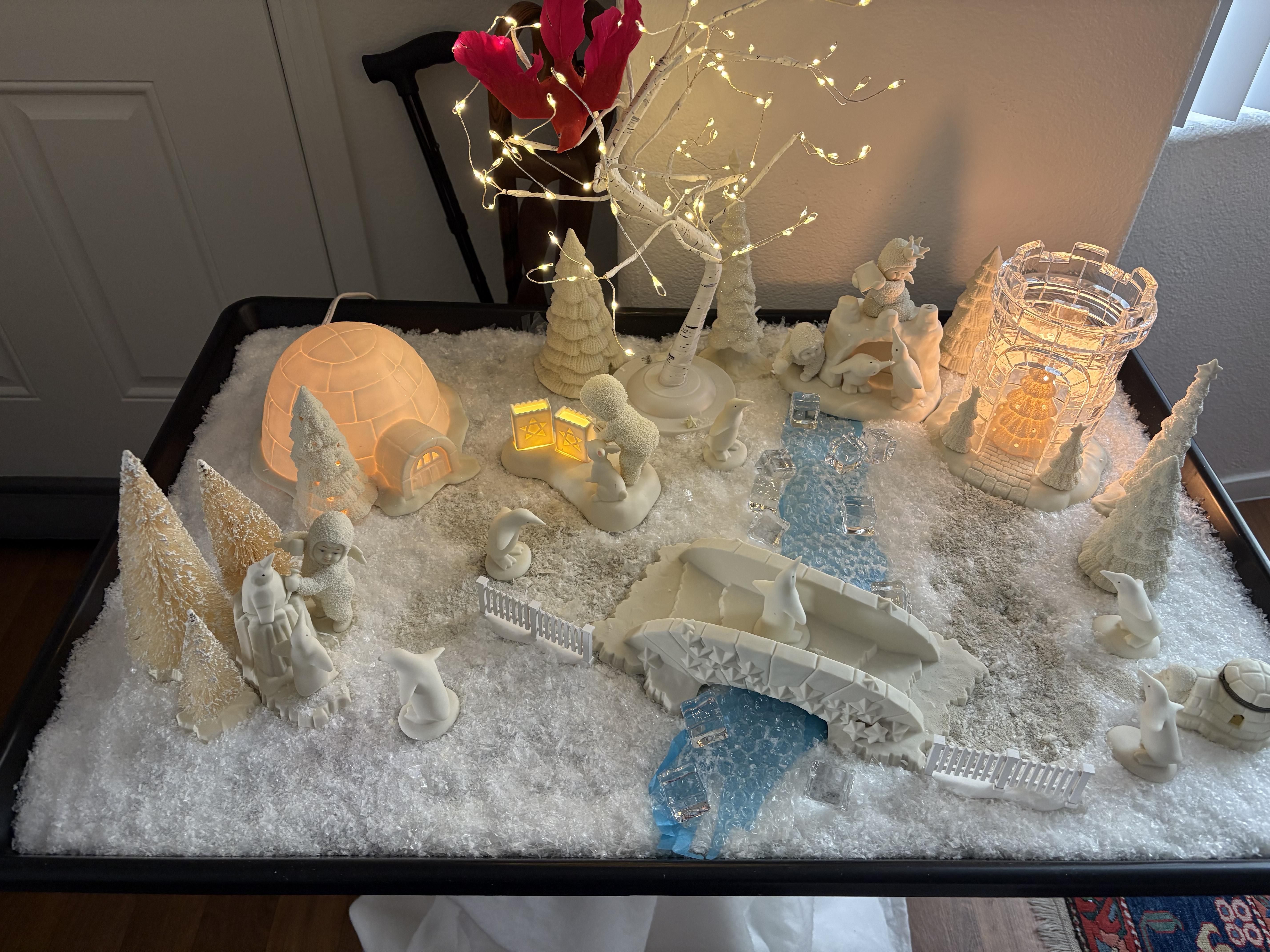 Collector’s Snowbabies winter igloo and ice sculpture display