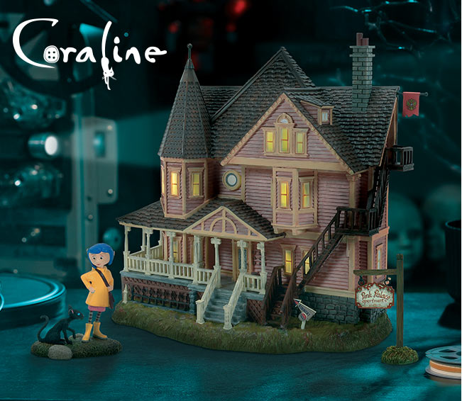Coraline Pink Palace Apartments and Coraline with cat figurine