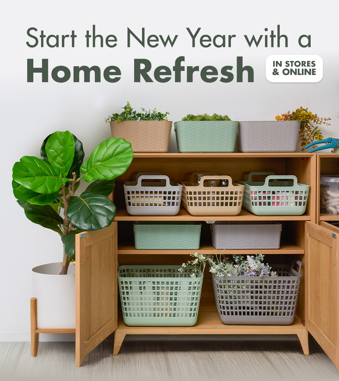 Headline Start the New Year with a Home Refresh and image of an open wooden cabinet with storage bins on shelves