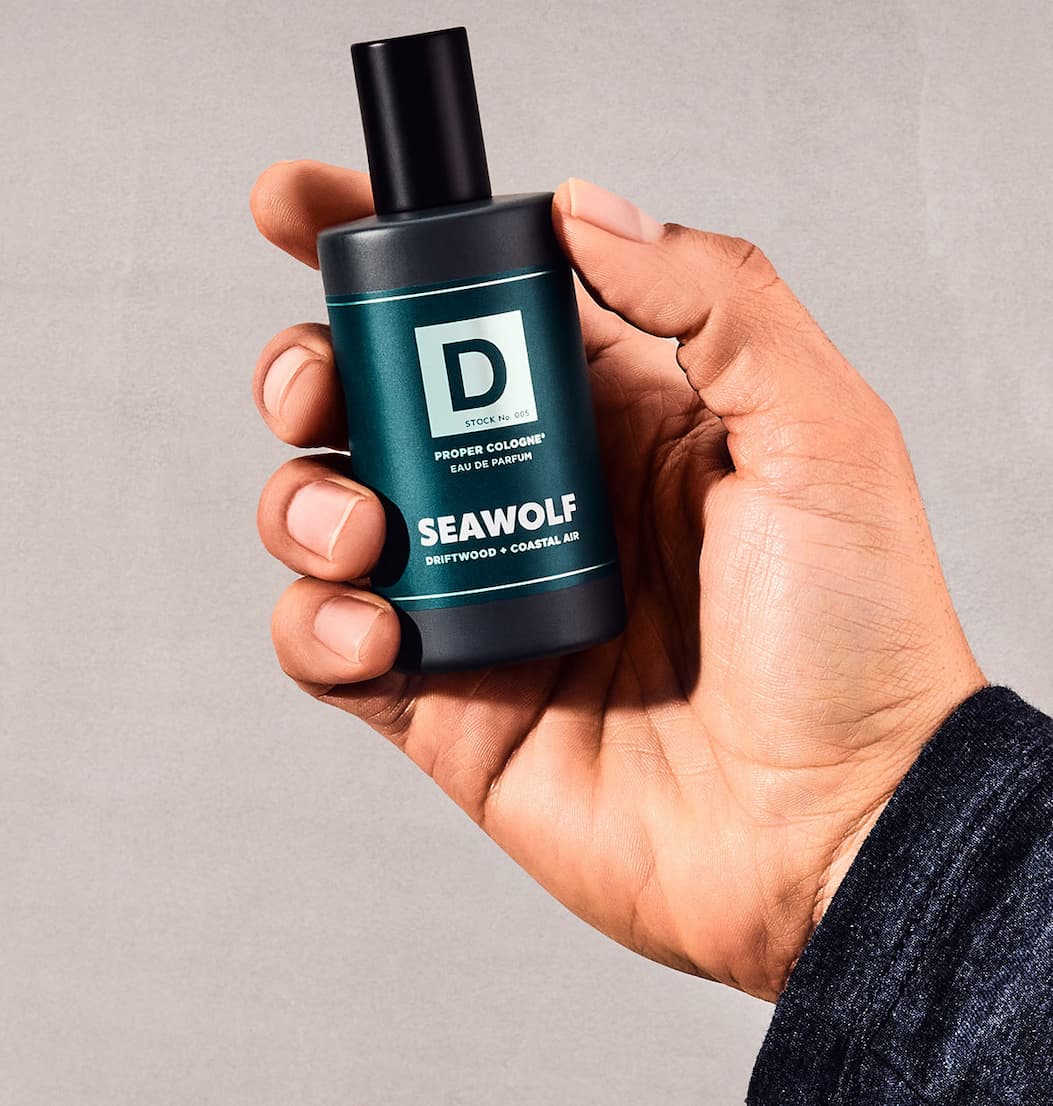Holding Seawolf Proper Cologne in hand.