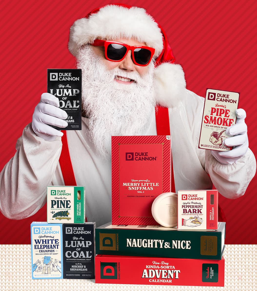 Santa Claus holding a lump of coal and Santa's pipe smoke big ass brick of soap.
