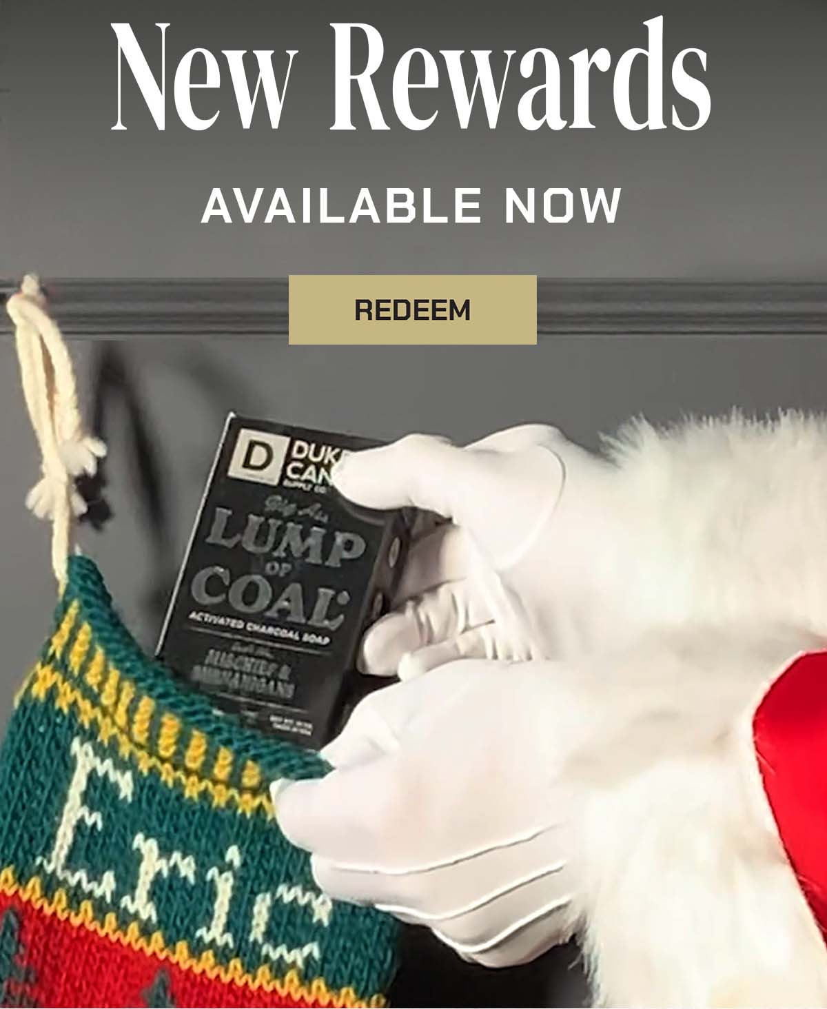 New Rewards Available Now. Redeem. Image shows Santa holding a Big Ass Lump of Coal.