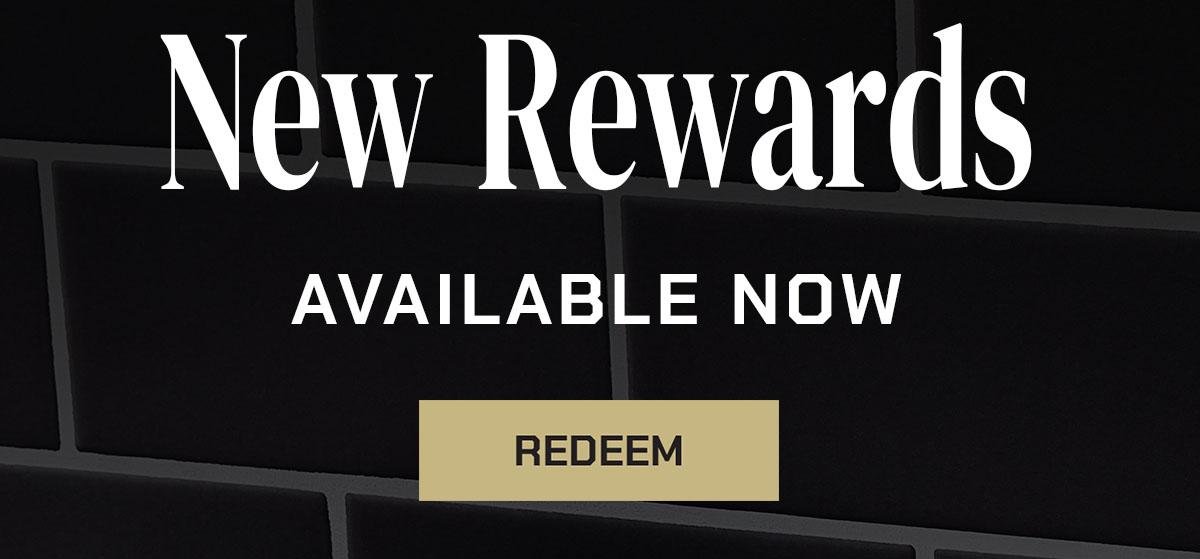 New Rewards Available Now. Redeem. Image shows Santa holding a Big Ass Lump of Coal.