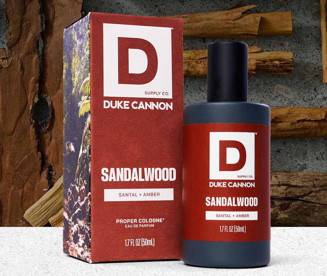 Sandalwood Proper Cologne featuring a wood background.