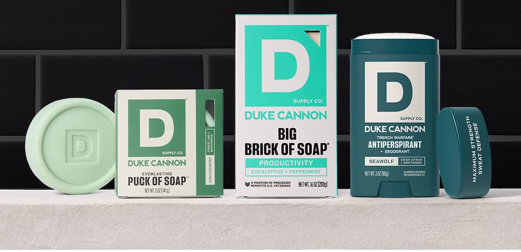 Duke Cannon Proper Cologne Mulligan Fairway + Oakmoss. With a golf like background.