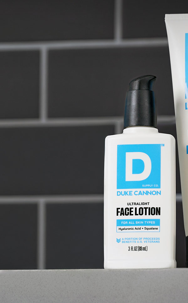 Duke Cannon Ultralight Face Lotion on a counter top
