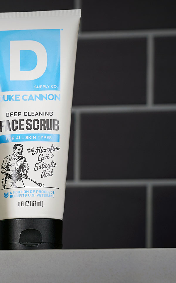 Duke Cannon Deep Cleaning Face Scrub on a countertop.