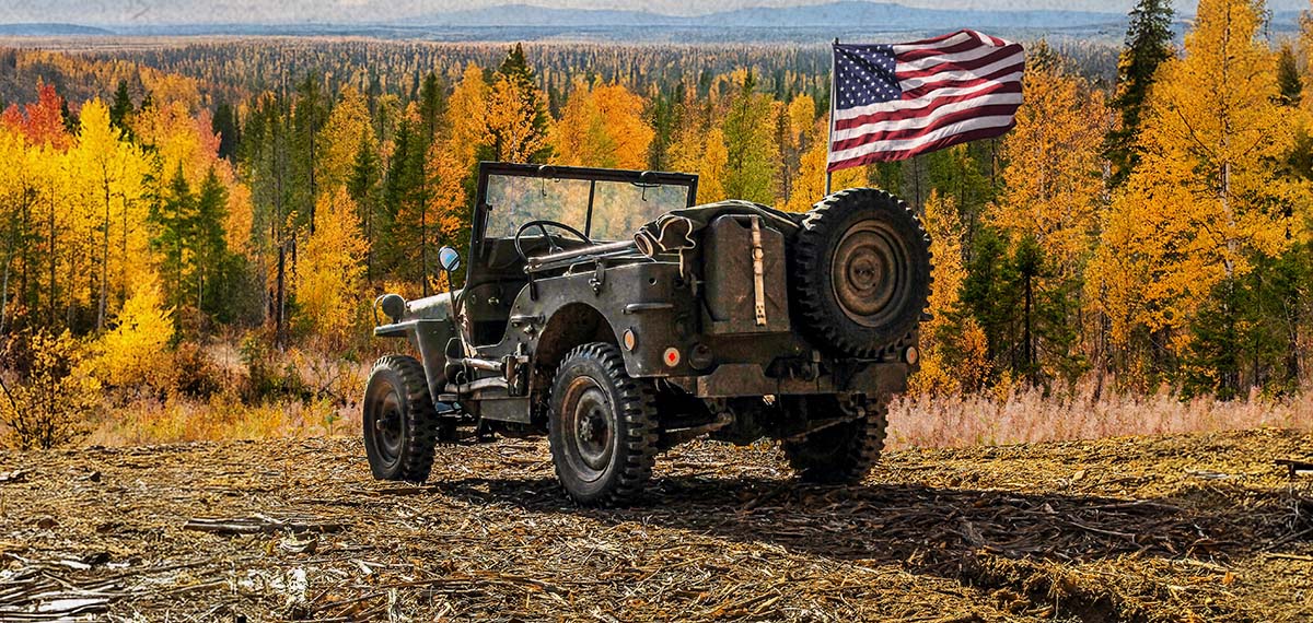 Buy American Legend - Button. Features a jeep with an American flag in the forest.