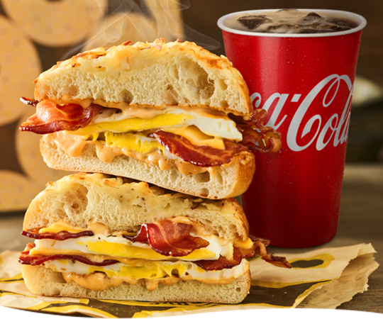 Stacked sandwich with Coca-Cola cup