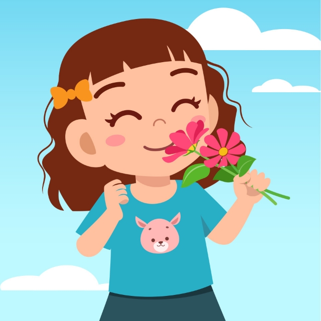 Little girl smelling flowers.