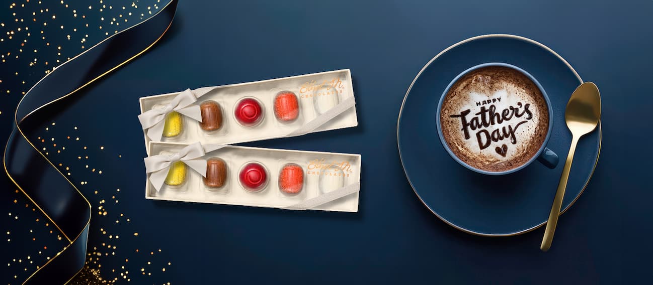 Ethel M Chocolates Liqueurs Collection with a cup of coffee that reads "Happy Father's Day".