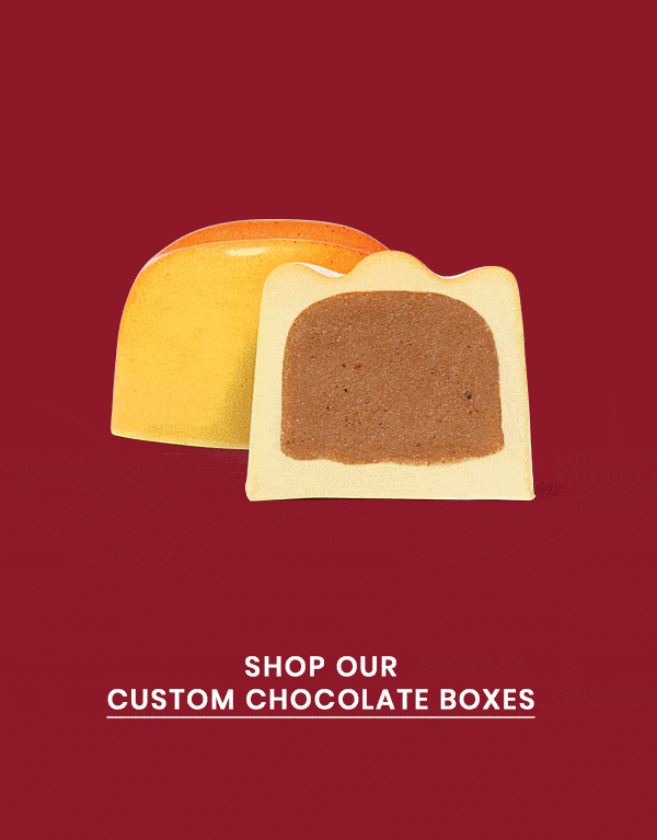 Rotating GIF of the Holiday themed chocolate gems. Shop our custom chocolate boxes.