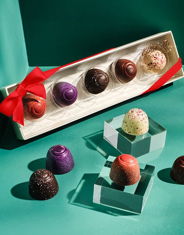 Ethel M Chocolates Truffles Sampler with Red Bow.