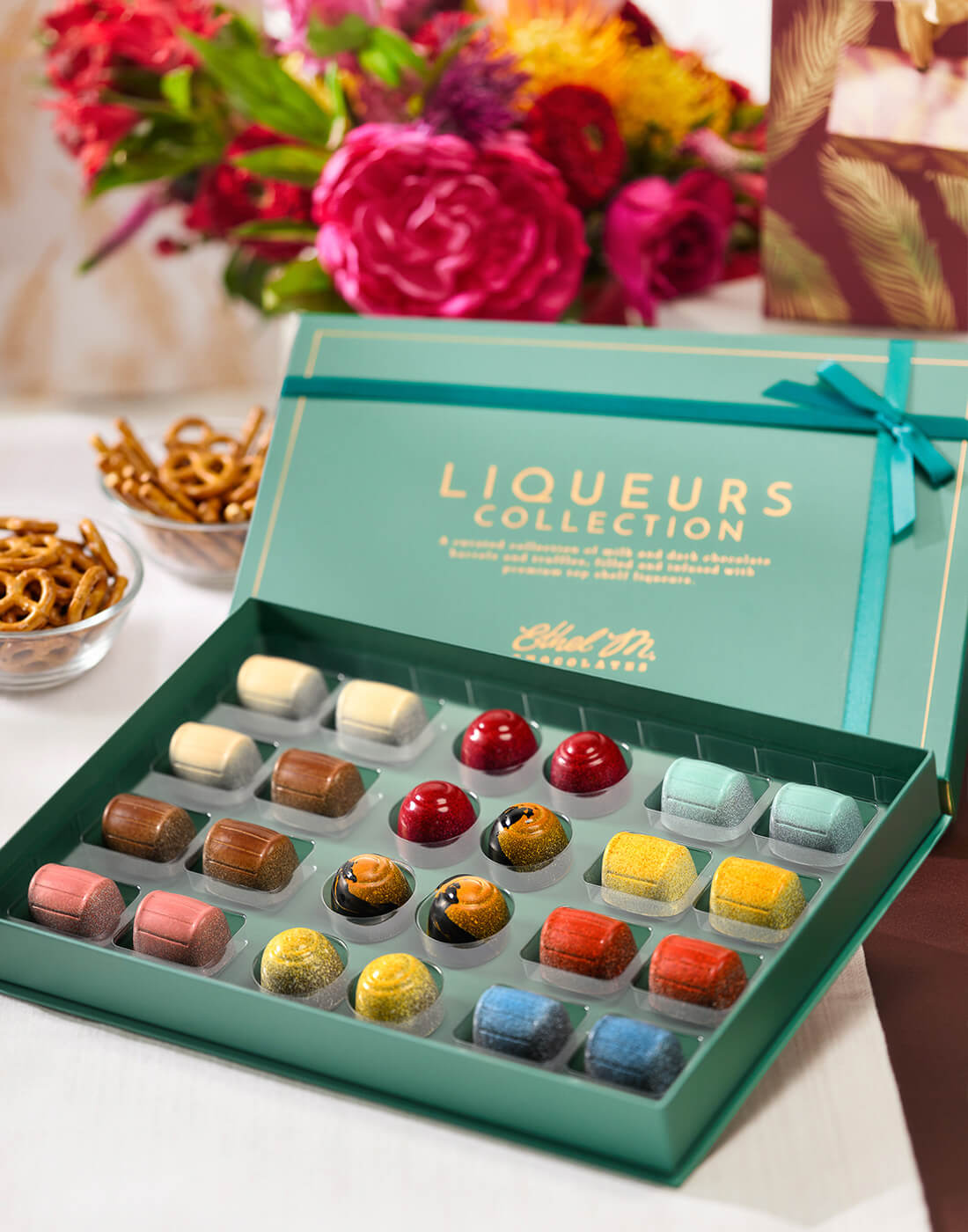 Elevate your game day spread with luxurious chocolates! Our Liqueurs Collection is a fan favorite.