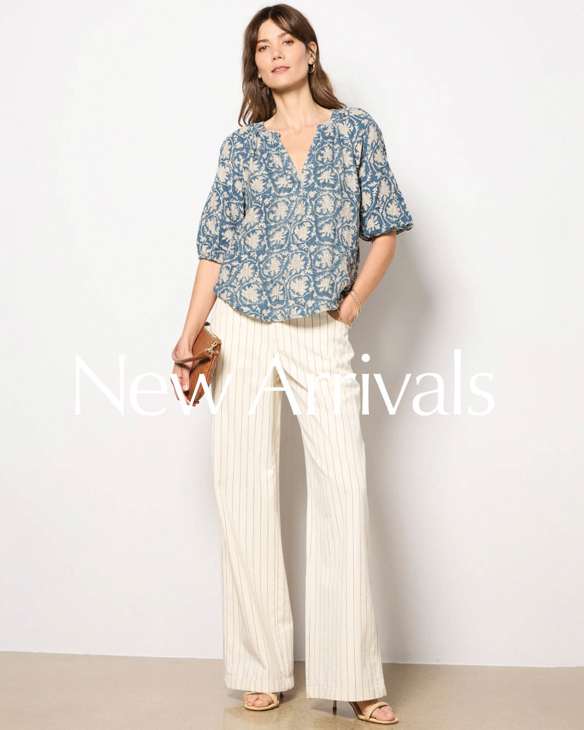 New Arrivals. Rotating image of woman in new look.