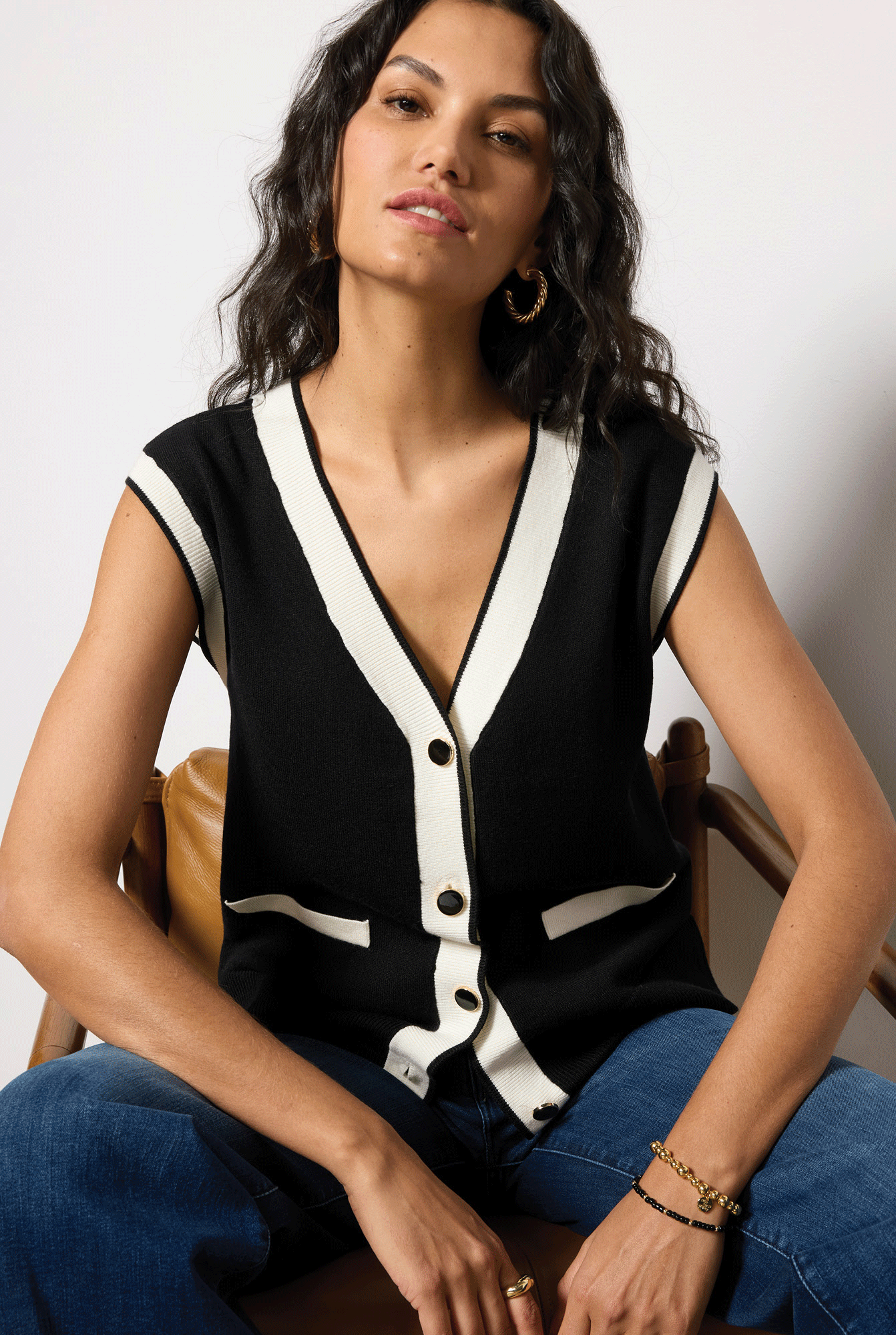 Rotating image of woman in new looks.