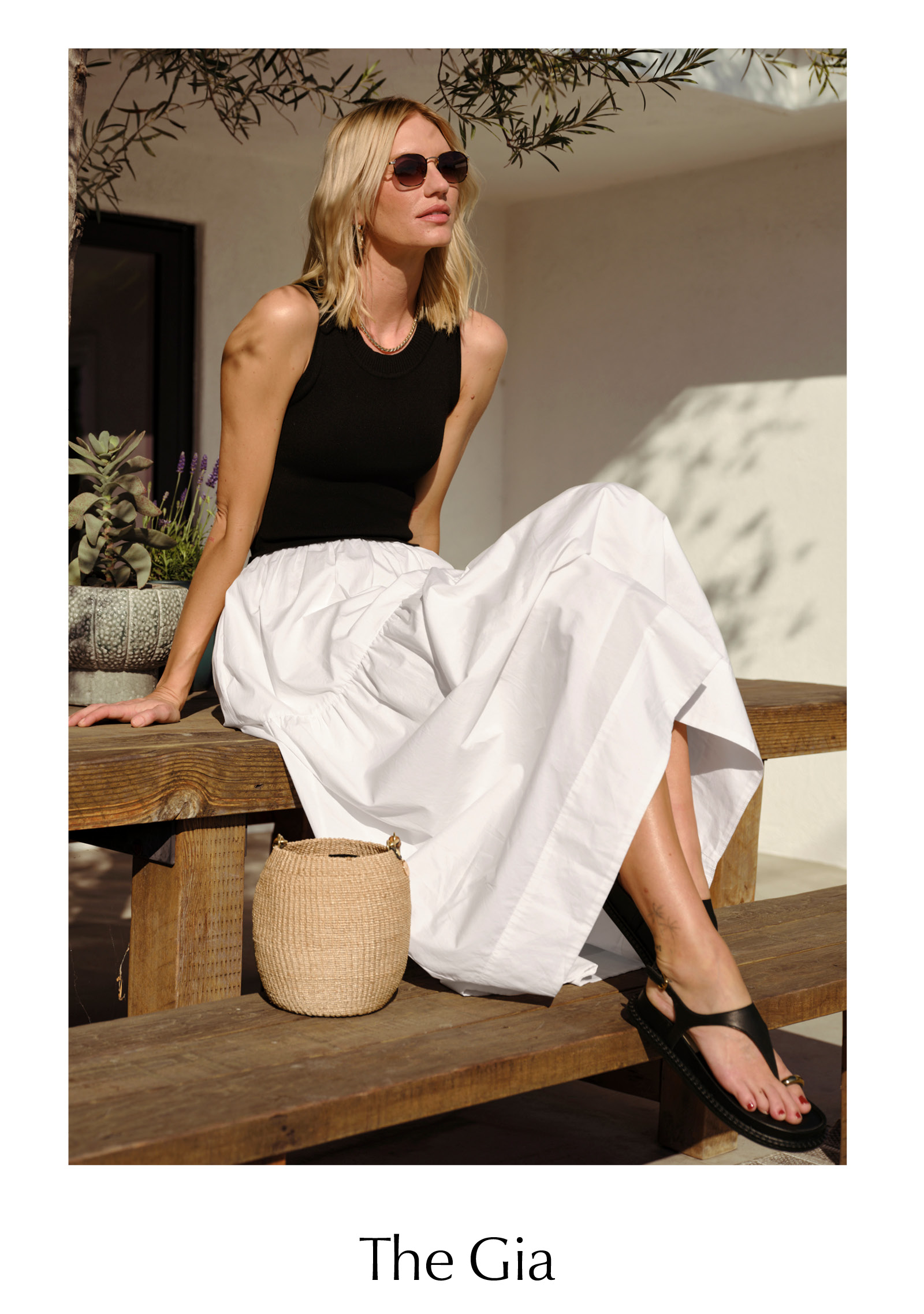 Image of woman in classic Gia dress. 
