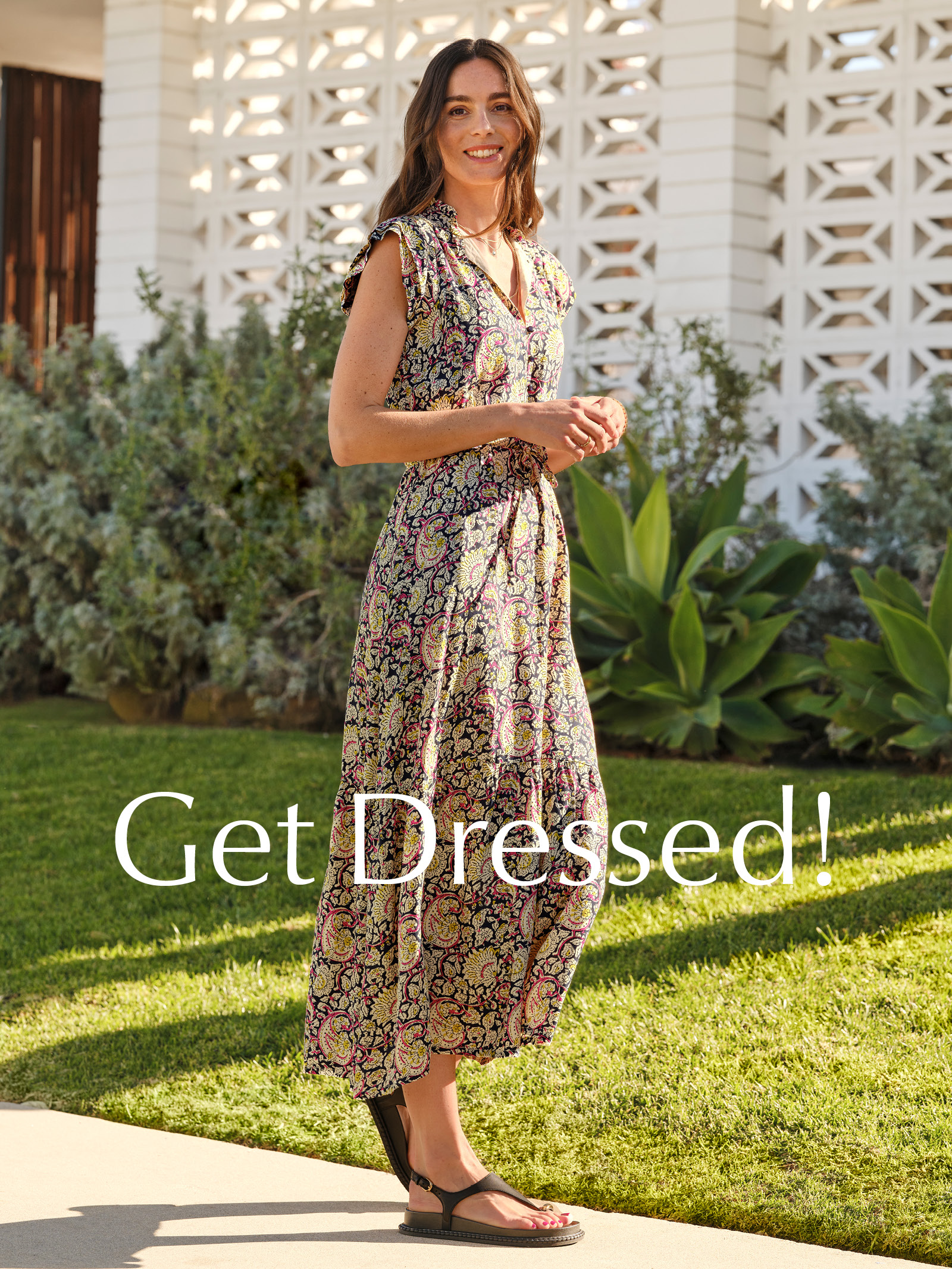 Get Dressed! Image of woman in long paisley dress. 