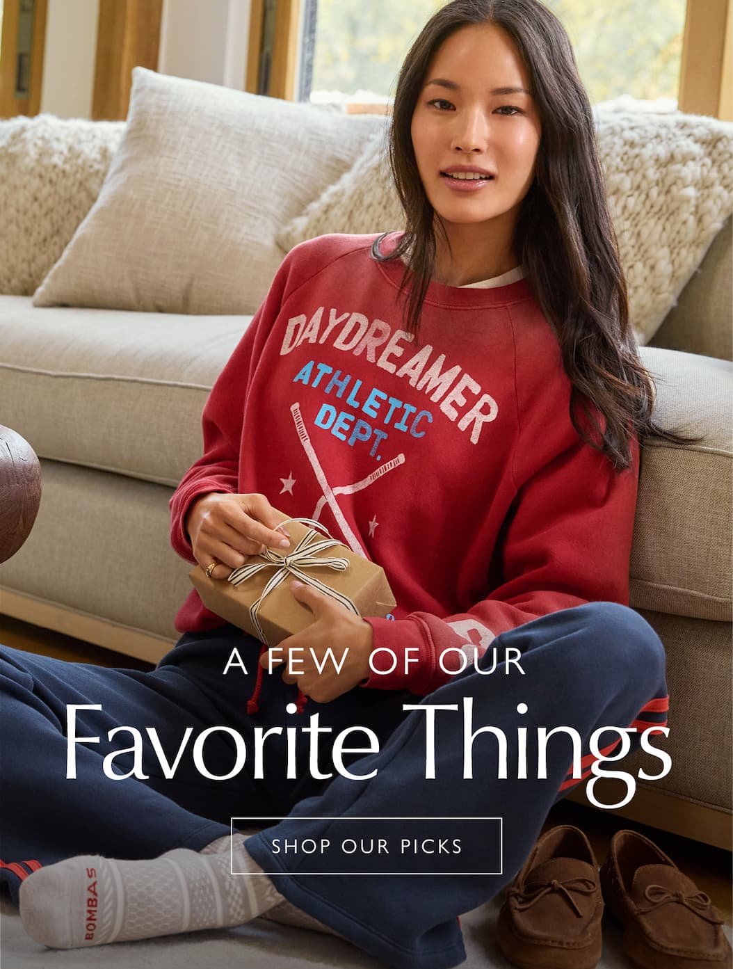 A few of our favorite things. Image of woman in comfy fashion. SHOP OUR PICKS