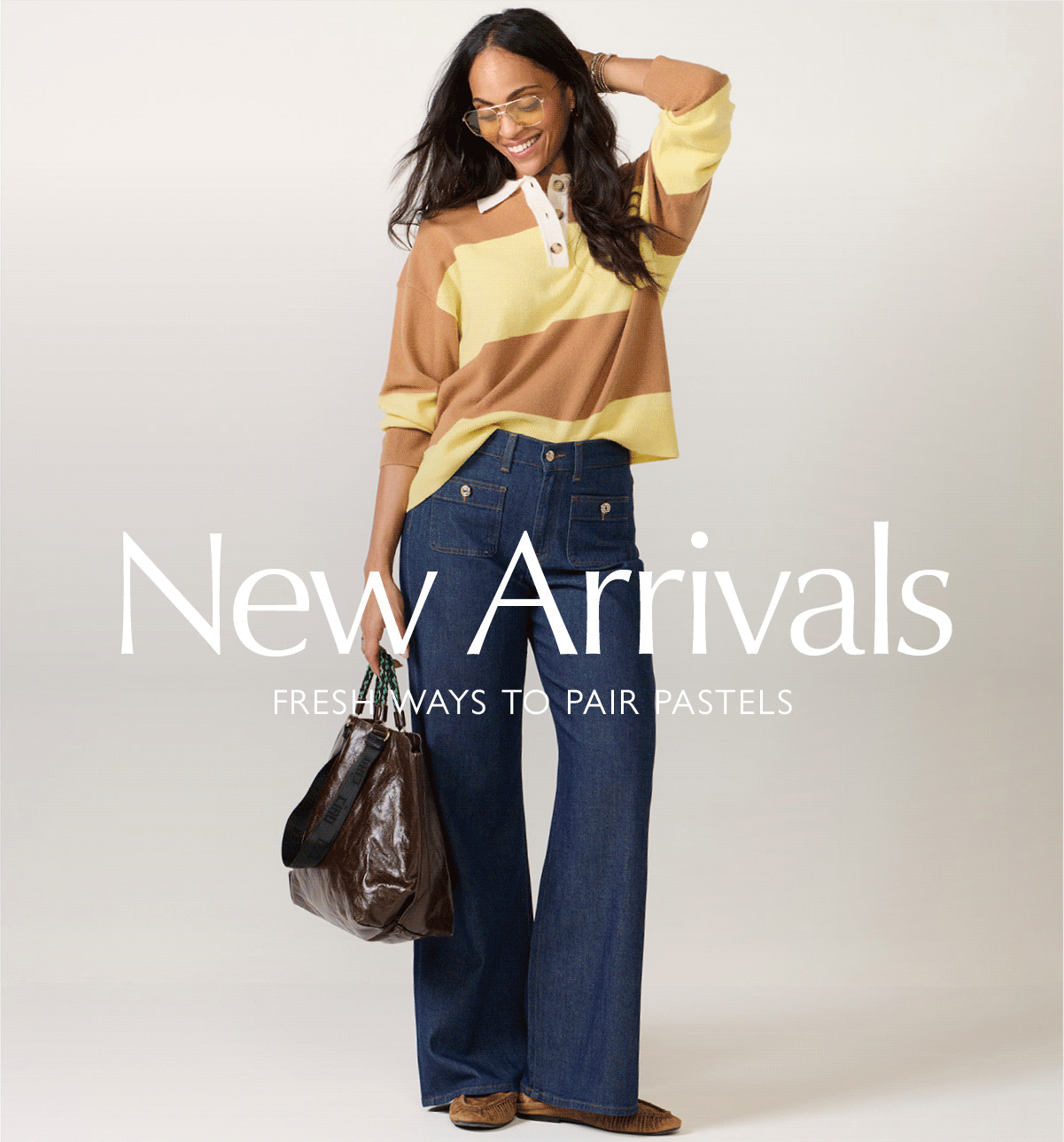 New Arrivals. Rotating images of woman in newest looks.