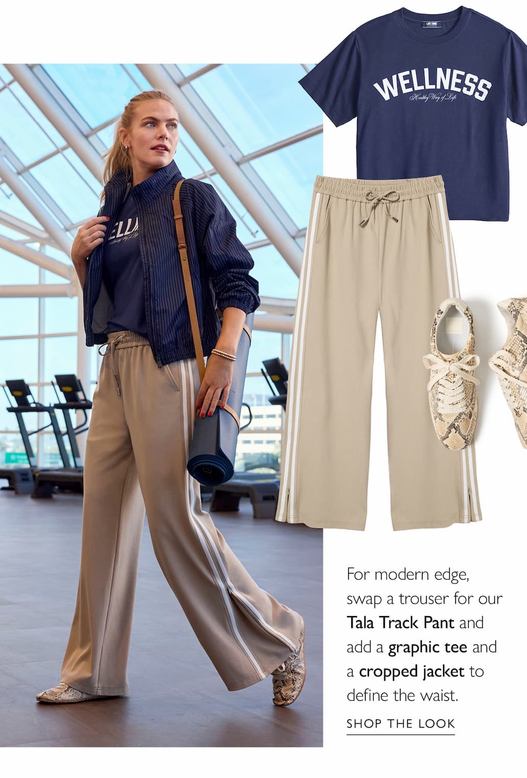 For modern edge, swap a trouser for our Tala Track Pant, add a graphic tee and cropped jacket to define the waist. Image of model in trouser and branded tee. SHOP THE LOOK