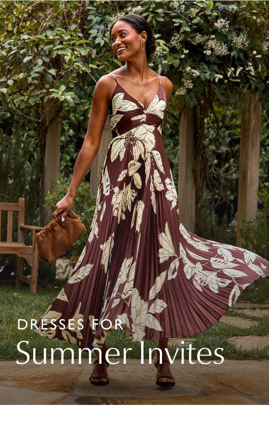 Dresses for Summer Invites. Image of model in beautiful floral patterned strapless dress from EVEREVE