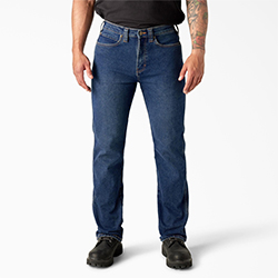 Waist down image of man wearing Dickies carpenter jeans