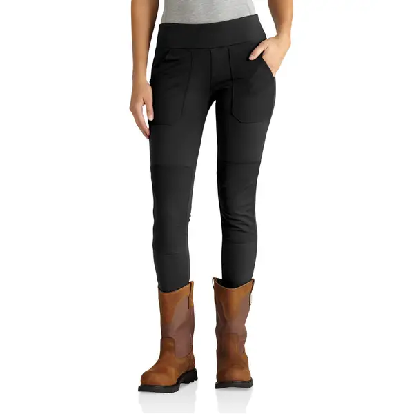 Waist down image of woman wearing Carhartt utility leggings