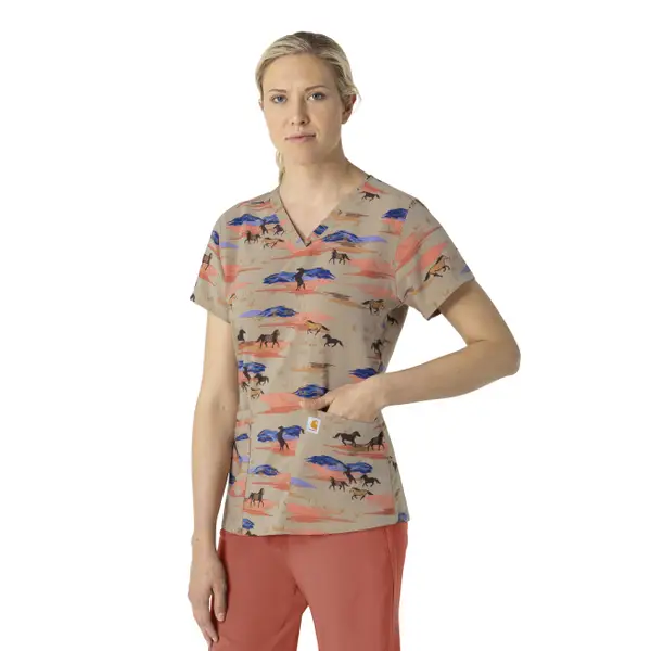 Woman wearing Carhartt Horse Patterned Scrubs