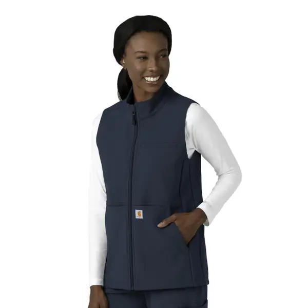 Woman smiling and wearing Carhartt Blue Fleece Vest