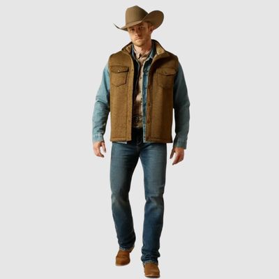 Man wearing vest with cowboy hat