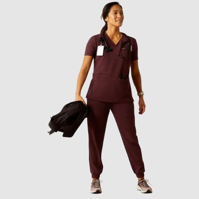 Woman wearing maroon scrubs
