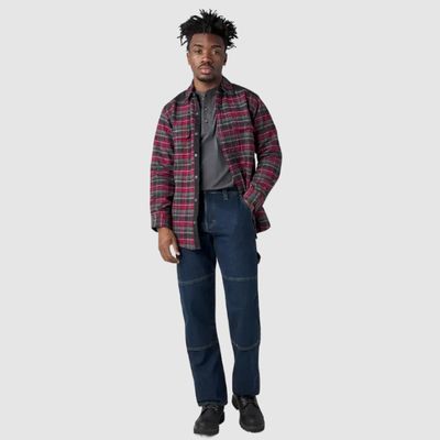 Cool guy wearing flannel shirt with jeans