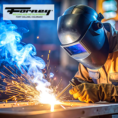 Person welding with sparks flying