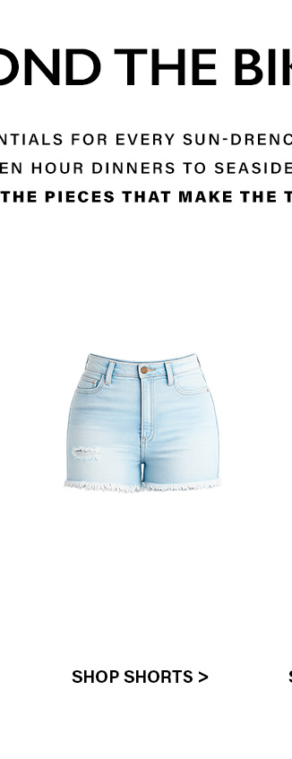 Light wash mid-rise distressed denim shorts with frayed hem. Essential casual summer shorts for everyday sun-drenched style.