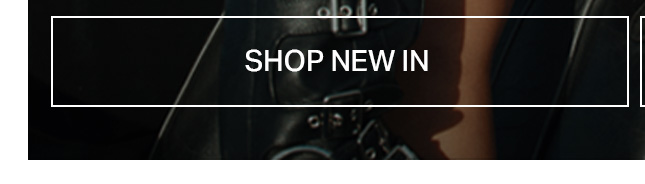 Dark, buckled leather-look clothing detail next to a bare arm. The overlay text says 'SHOP NEW IN' to discover our latest fashion arrivals.