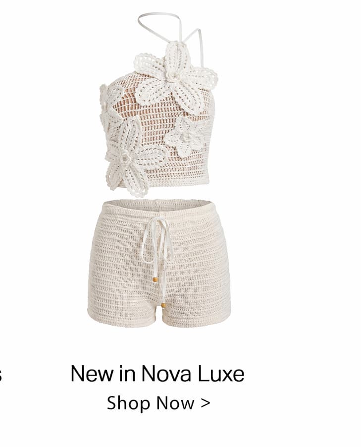 Off-white crochet two-piece set: a floral-appliqued halter crop top with matching high-waisted drawstring shorts. Discover new Nova Luxe summer styles.