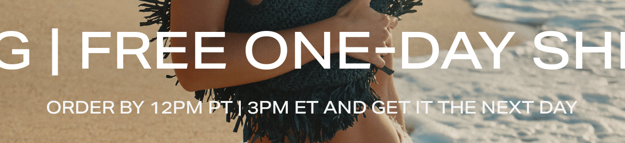Person on beach wearing a dark fringed cover-up, promoting free one-day shipping. Order by 12 PM PT/3 PM ET for next-day delivery.
