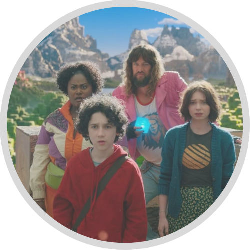 Jason Momoa, Emma Myers, Danielle Brooks, and Sebastian Hansen standing by at the top of a castle wall, with forest and mountains in the background  in A Minecraft Movie (1)