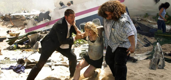 Matthew Fox and Jorge Garcia helping up Emilie de Ravin after a catastrophic plane crash in Lost