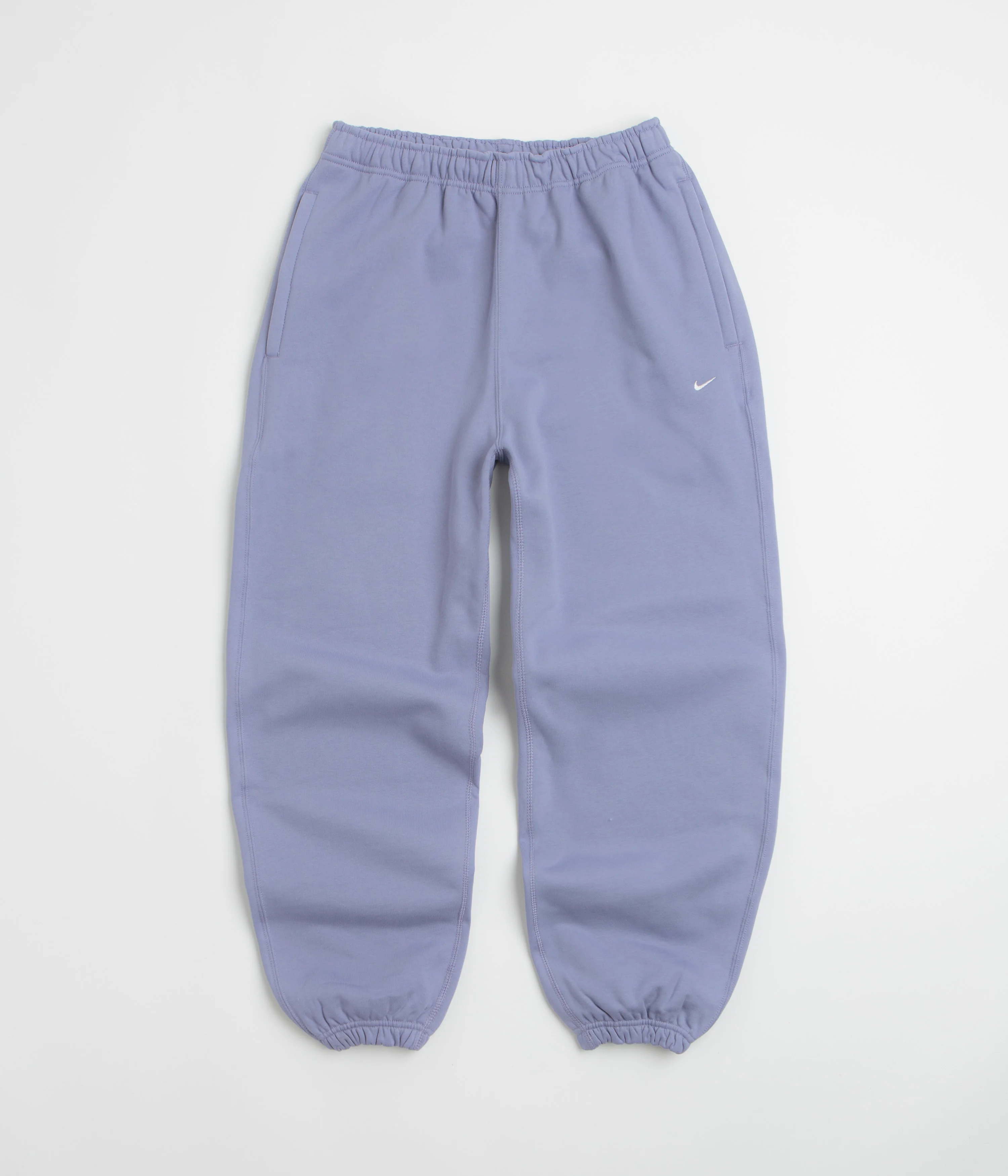 Image of Nike Solo Swoosh Cuffed Sweatpants - Iron Purple / White