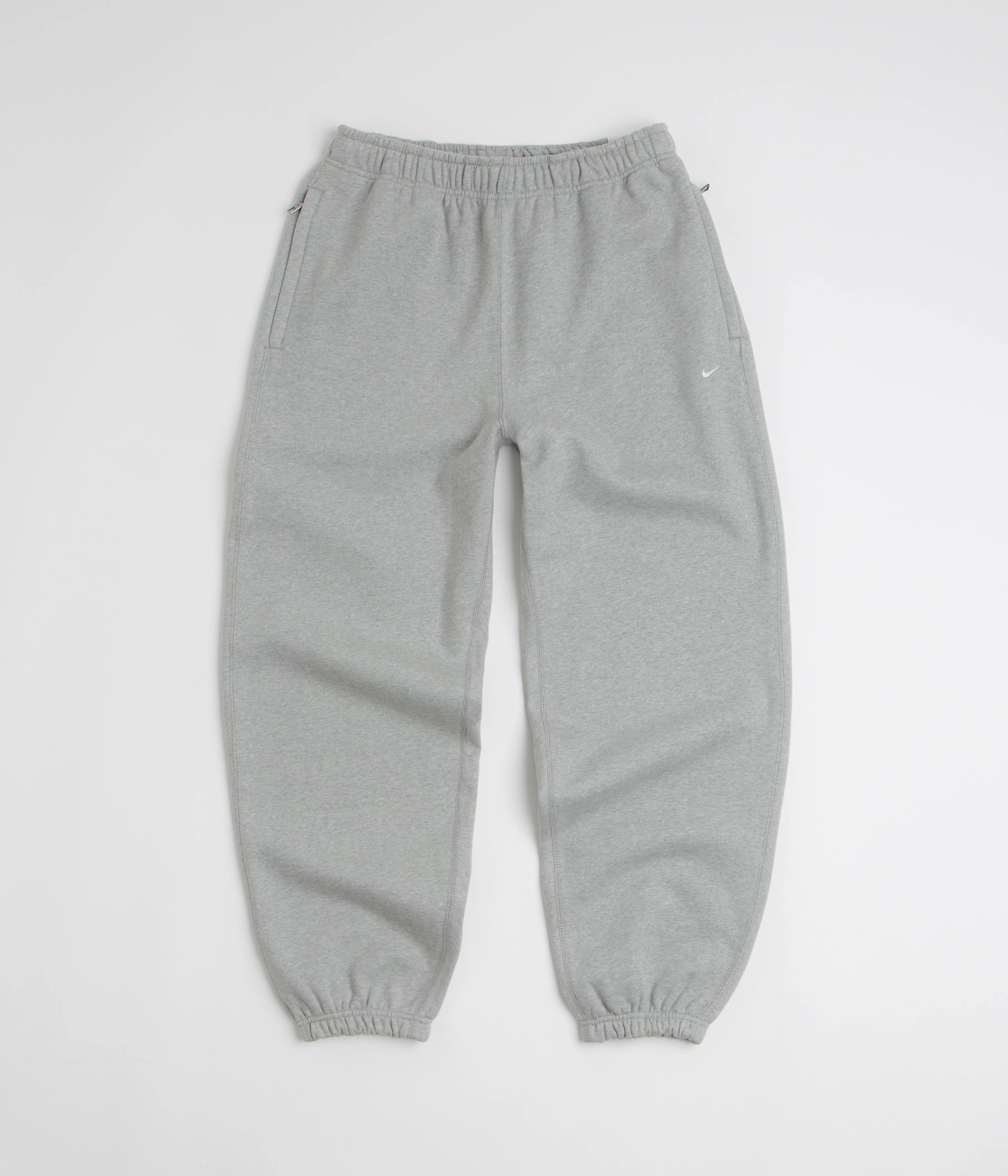 Image of Nike Solo Swoosh Cuffed Sweatpants - Dark Grey Heather / Light Smoke Grey / White