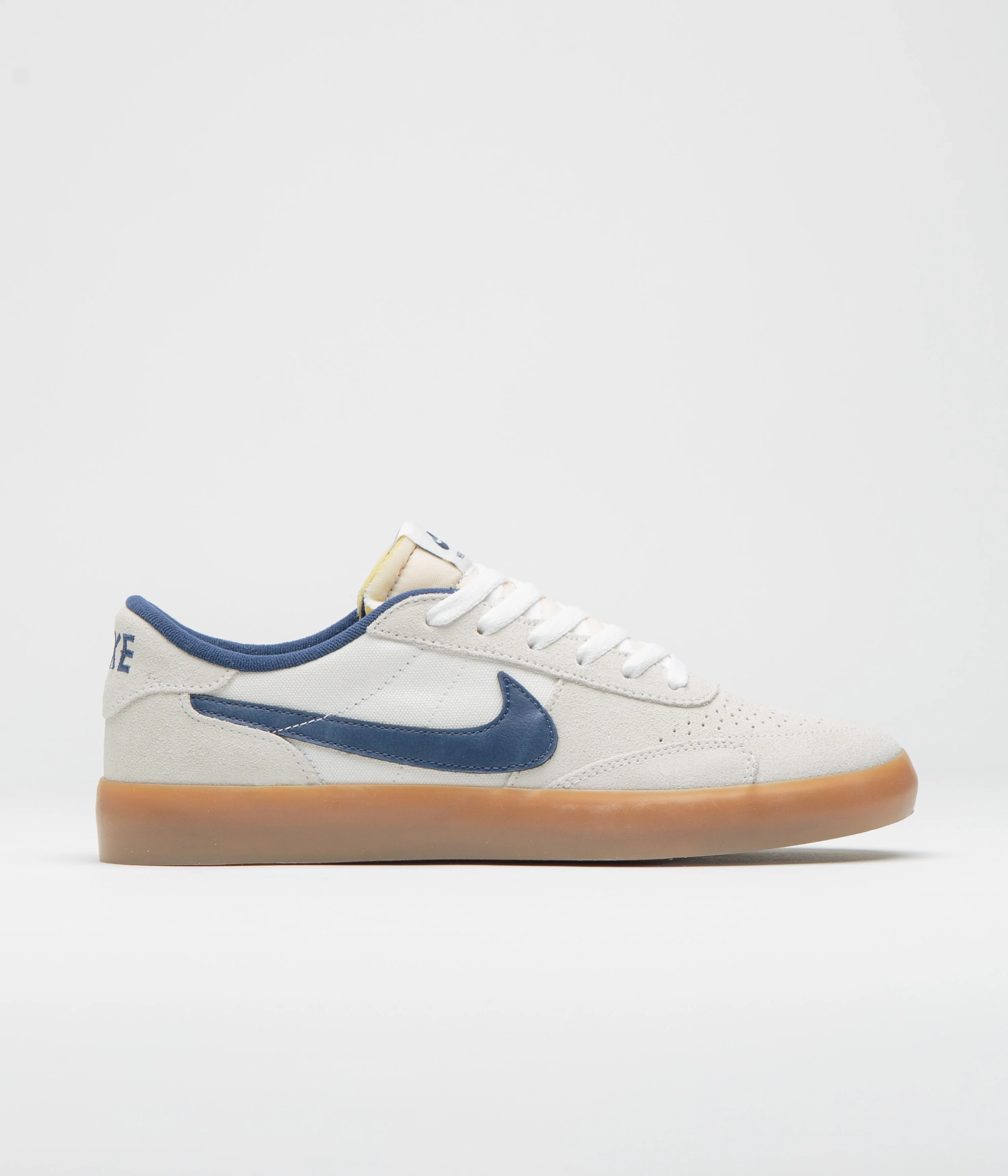 Image of Nike SB Heritage Vulc Shoes - Summit White / Navy - White - Gum Light Brown