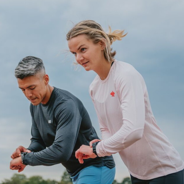 Runners wearing GPS watches