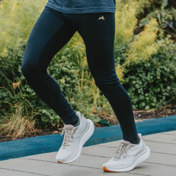 Man wearing Tracksmith tights