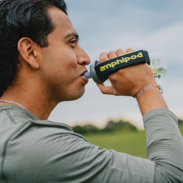 Man drinking from an Amphipod bottle