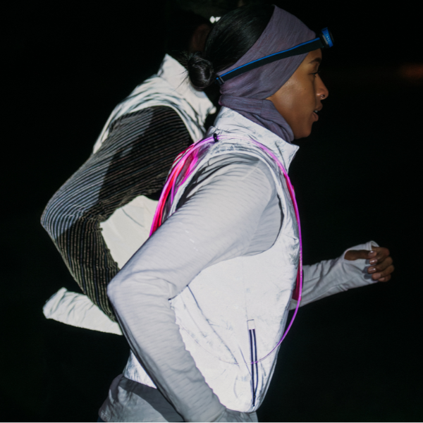 Runners wearing visibility gear