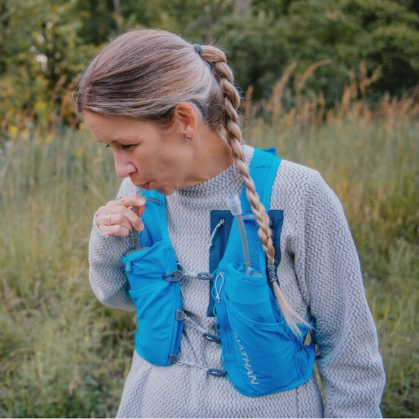 Woman wearing a hydration vest