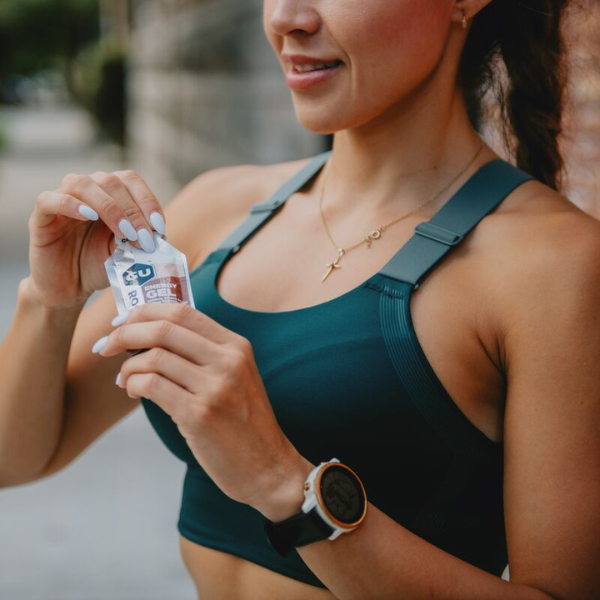 Woman holding an energy gel
